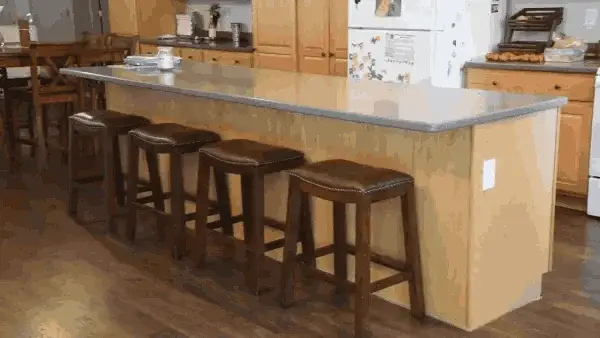How many seats can the kitchen island accommodate
